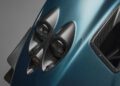 Close-up of a Blue Carbon Zonda's rear lights and air vent, showcasing the Zonda Roadster’s sleek design and modern carbon fiber materials.