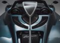 Close-up view of a Pagani Zonda Roadster cockpit and dashboard, highlighting its aerodynamic design and striking Blue Carbon metallic finish.