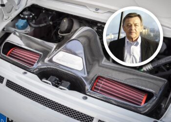 Close-up of the last production Porsche with a Mezger flat-six engine, the GT3 RS 4.0, featuring carbon fiber components; inset shows a man in a suit standing outdoors.