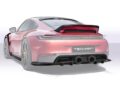 A digital rendering of a red 992.2 Carrera sports car showcases TECHART performance upgrades, featuring a rear wing spoiler, dual exhaust pipes, and TECHART branding on the rear license plate.