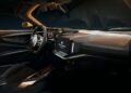 Interior view of Italy’s latest V12 supercar, featuring a sleek dashboard, digital displays, leather seats with yellow stitching accents—a true luxury ride that packs quad turbos and rear-wheel drive thrill.