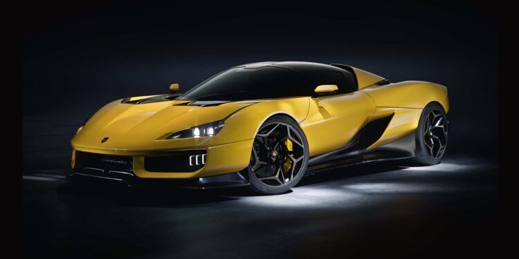 A yellow sports car with black accents, photographed in a dark studio setting with accent lighting highlighting its sleek design—Italy’s Latest V12 Supercar redefines luxury and performance.