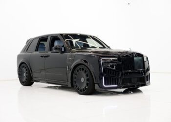 A black 2025 Cullinan luxury SUV with tinted windows and custom wheels, showcased in a minimal white studio setting. Available as a Limited Spec at your Mansory Dealer.