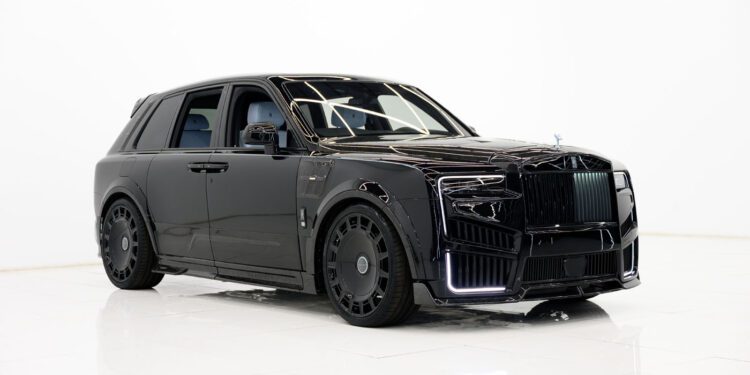A black 2025 Cullinan luxury SUV with tinted windows and custom wheels, showcased in a minimal white studio setting. Available as a Limited Spec at your Mansory Dealer.
