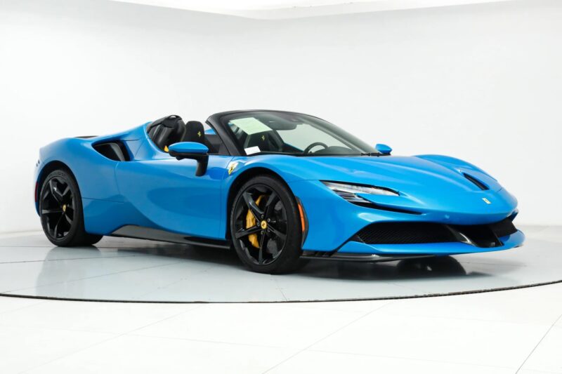 A blue Ferrari sports car on a white floor showcases the allure of unique Ferrari colors.