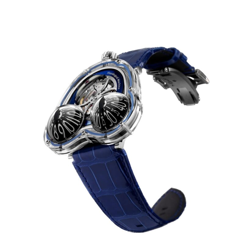 A wristwatch with a blue textured strap and a unique dial featuring two domed sections for hours and minutes, making it a standout among the best luxury watches.