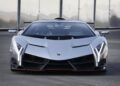A Few-Off silver Lamborghini sports car is parked on a paved surface, viewed from the front, showcasing angular headlights and a sleek aerodynamic design.