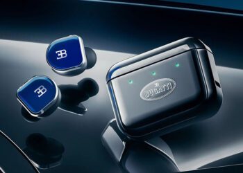 A pair of blue Bugatti-branded wireless earbuds and their matching charging case rest on a reflective dark surface—luxury accessories perfect to upgrade your style.