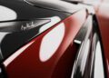 Close-up of the Pininfarina Battista’s rear section featuring a red taillight, glossy black surface, and a signature detail unique to the Battista Novantacinque.