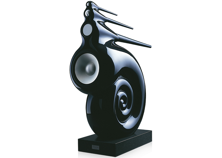 A modern, black high-end loudspeaker with a spiral, sculptural design and multiple protruding sound tubes, displayed on a rectangular base—an exquisite addition to refined living and the ultimate in luxury home accessories.