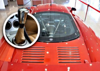 A red sports car with a visible rear engine under glass; inset shows a close-up of a manual gear shift lever inside the car—one of the best manual supercars for sale.