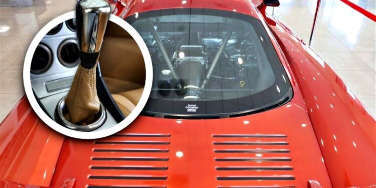 A red sports car with a visible rear engine under glass; inset shows a close-up of a manual gear shift lever inside the car—one of the best manual supercars for sale.