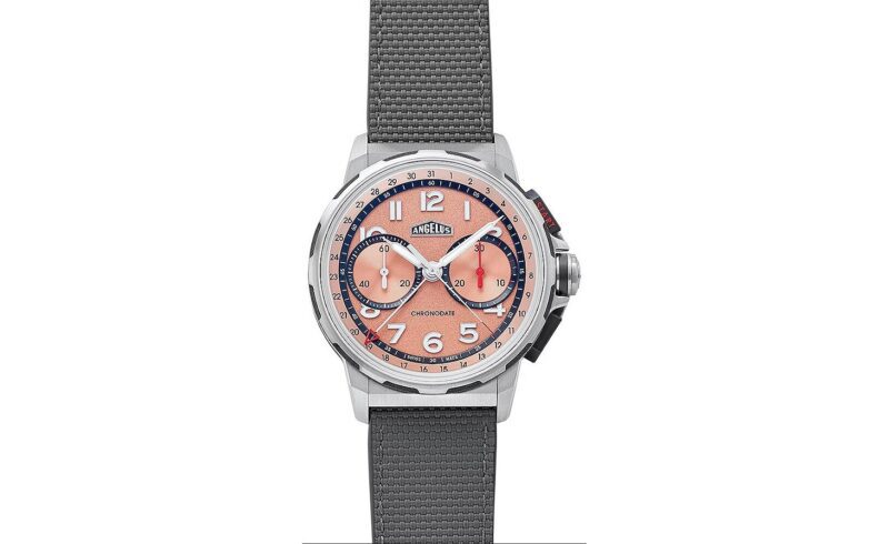 A wristwatch with a pink dial, silver bezel, grey strap, and two subdials, featuring white hour markers and Arabic numerals—an elegant pick for those seeking the best luxury watches.