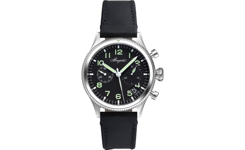 A wristwatch with a black leather strap, black dial, white and green Arabic numerals, two subdials, and two pushers on the right side of the silver case—a refined choice among the best luxury watches.
