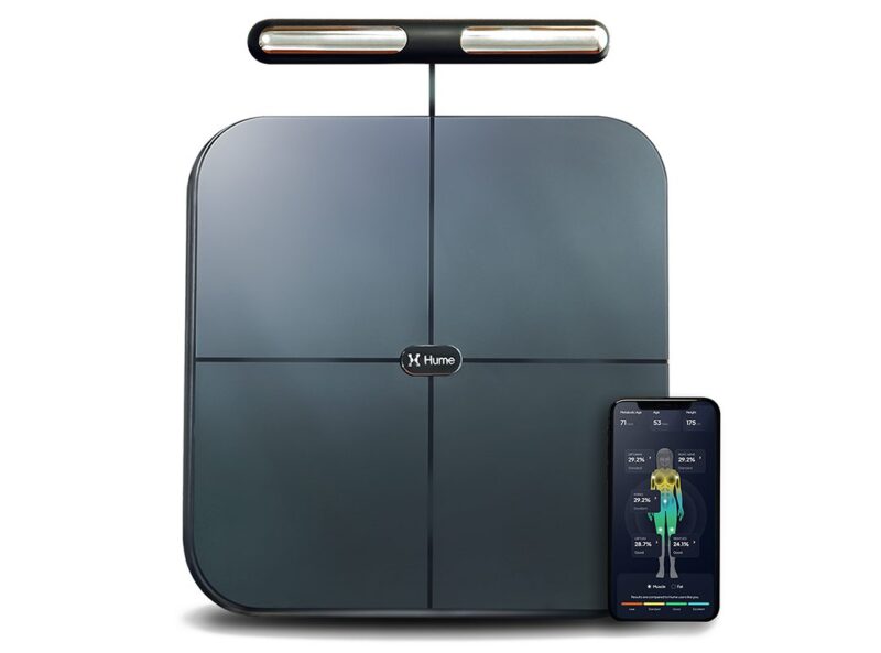 A smart body scale with a handle and digital display, shown alongside a smartphone displaying health metrics and body composition data—an ideal pick featured in the duPont REGISTRY Father’s Day Gift Guide.