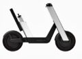 A minimalist, modern electric scooter with large black wheels and a silver frame, shown in side profile on a white background—demonstrating how Infinite Machine’s Olto aims to reinvent the bike lane.