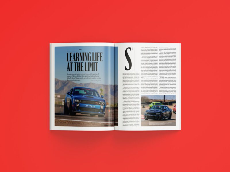 An open July 2025 issue of duPont REGISTRY rests on a red background, displaying an article titled "Learning Life at the Limit" alongside striking images of sports cars racing on a track.