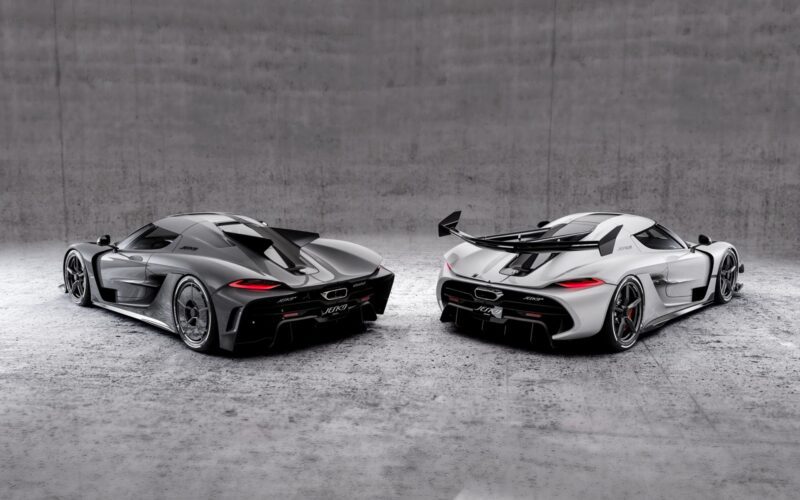 Two high-performance sports cars, including a Koenigsegg track-focused hypercar, are parked side by side in a minimalist, concrete indoor setting, awaiting their June 25 reveal.