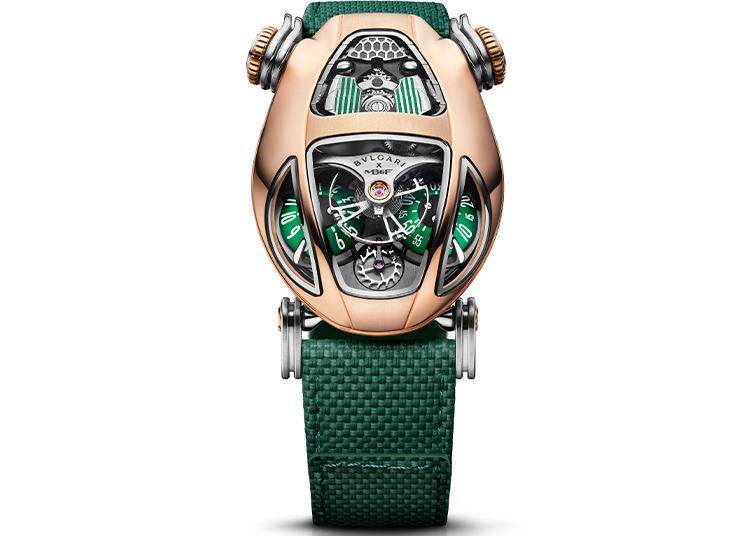 A luxury wristwatch with a gold-toned, futuristic case, green and black dial accents, multiple displays, and a textured green strap—one of the horological highlights among 2025 watch releases.