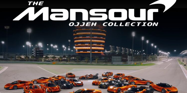 A group of ultra-exclusive McLarens parked in formation on a racetrack at night, with a lit circular building and "The Mansour Ojjeh Collection" text above.