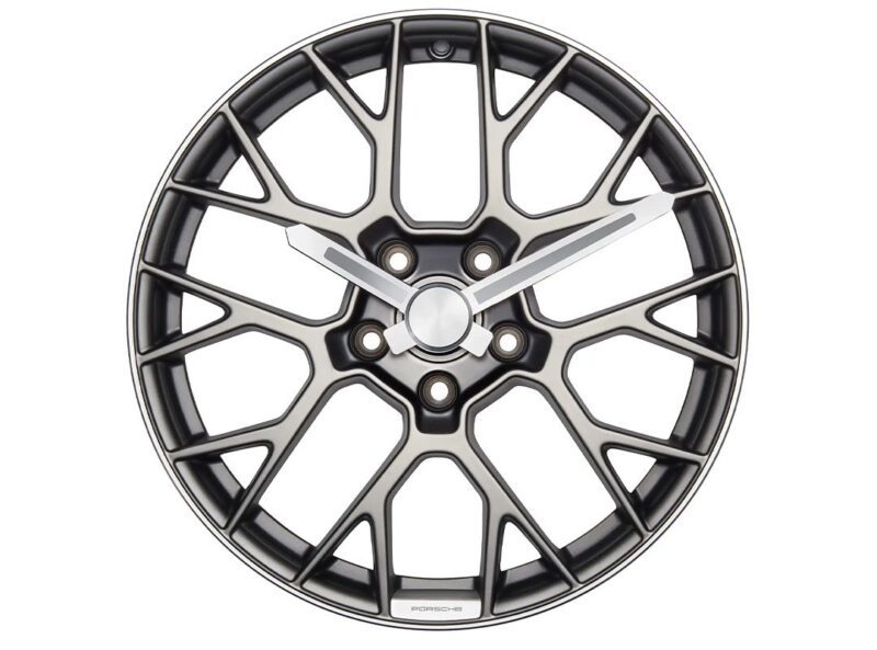 A wall clock designed to look like a multi-spoke alloy car wheel rim, with two clock hands and a central hub—a unique pick for duPont REGISTRY's Father’s Day gift guide.