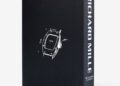 Black coffee table book titled "RICHARD MILLE" with a white line drawing of a watch on the cover, featuring "THE IMPOSSIBLE COLLECTION" and "ASSOULINE" on the spine.