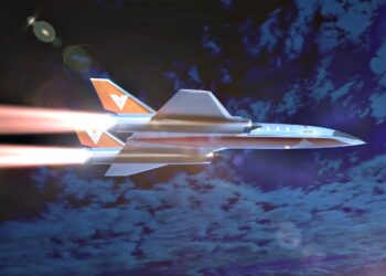 A futuristic jet aircraft with orange accents flies above the clouds at high speed, leaving bright exhaust trails behind—could this be the 4600 mph hypersonic jet that makes Miami to Dubai in 2 hours a reality?.