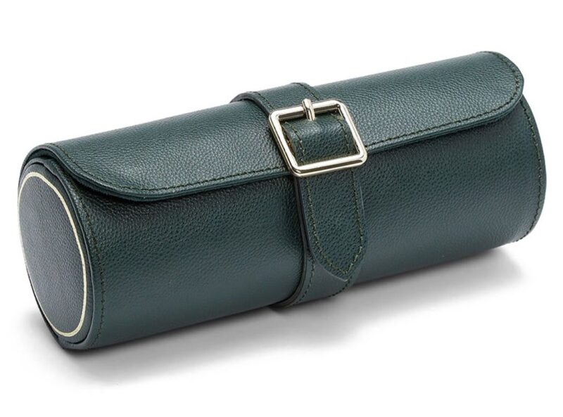 A dark green cylindrical leather case with a flap closure and silver buckle strap, featured in the duPont REGISTRY Father's Day Gift Guide, placed on a white background.