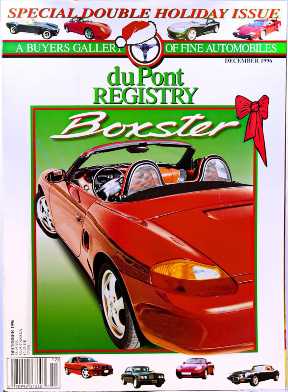 Cover Cars: December 1996 duPont REGISTRY magazine, featuring a red Porsche Boxster convertible with a holiday theme and images of other cars at the bottom for its 40th Anniversary issue.