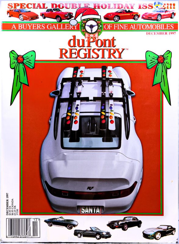 A white sports car with skis mounted on the roof, photographed from above, graces the duPont REGISTRY’s December 1997 holiday issue of Cover Cars.