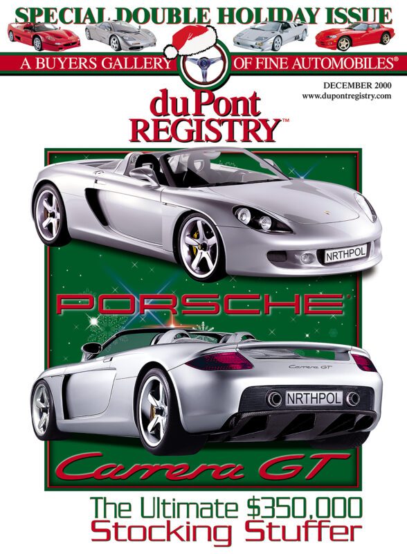Magazine cover featuring two silver Porsche Carrera GT convertibles, both with "NRTHPOL" license plates, on a festive green background with holiday-themed text, celebrating the duPont REGISTRY 40th Anniversary Cover Cars.