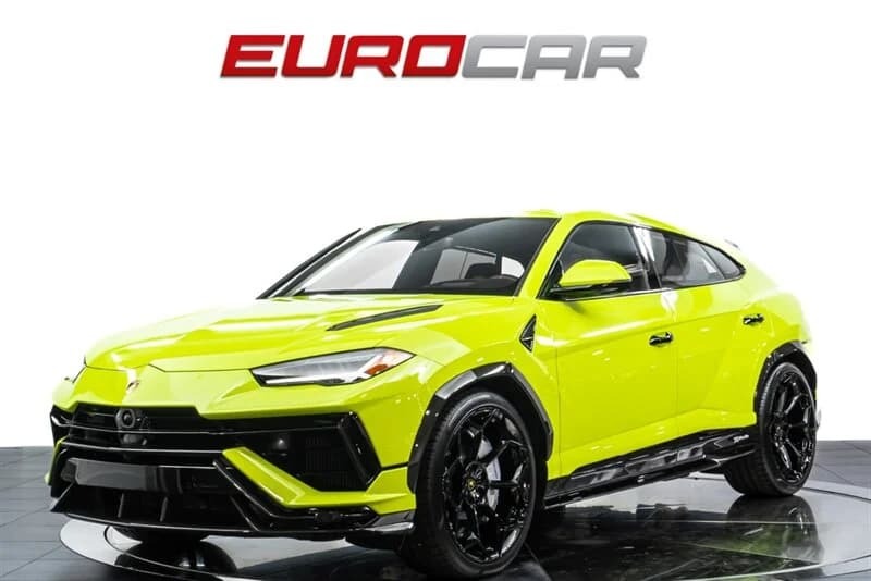 A bright yellow Lamborghini Urus SUV is displayed in a showroom with a "EUROCAR" sign on the wall behind it, capturing attention with its bold Lamborghini styling—almost as striking as their famous Verde Scandal paint.