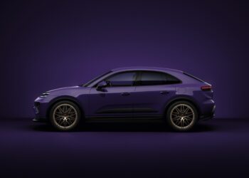 A purple SUV is shown in side profile view against a matching purple background.