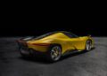 A yellow and black Ferrari Daytona SP3 with a low, aerodynamic design is parked on a dark, textured surface, viewed from the rear left side—an eye-catching highlight perfect for any Car Week Charity Auction.