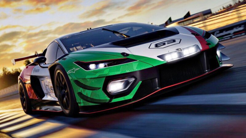 A Temerario GT3 marks Lamborghini’s next chapter in GT3 endurance racing as it speeds along the racetrack at sunset, its green, white, and red livery glowing under the headlights with motion blur highlighting its velocity.