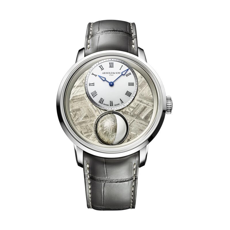 A luxury wristwatch with a gray leather strap, silver case, white Roman numeral dial, and a textured subdial featuring a large circular accent—an elegant addition to any collection of the best luxury watches.