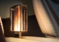 A modern lamp with a glowing vertical light and a "Bentley" label adds luxury style, sitting on a beige car seat between two white seats—echoing the refined elegance of an EV Concept interior.
