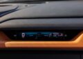 A digital car dashboard display shows speed at 0 km/h, the gear in park mode, and a graphic indicating hybrid system status—ideal for a track review of the Lamborghini Temerario or the Revuelto.