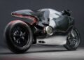 A modern motorcycle with a sleek, reflective silver body, minimalistic design, and exposed rear wheel is displayed in a studio setting—truly rideable art that blurs the line between machine and futuristic aluminum sculpture.