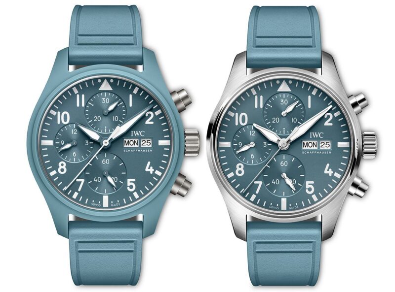 Two blue IWC Pilot’s Chronograph 41 watches with matching blue straps—one featuring a full blue case, the other a silver case—both display the day and date, showcasing signature TOP GUN precision and style.