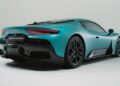 A teal 2026 Maserati MCPURA debuts at Goodwood, shown from the rear and side against a plain white background, featuring a liquid crystal roof and F1 tech.