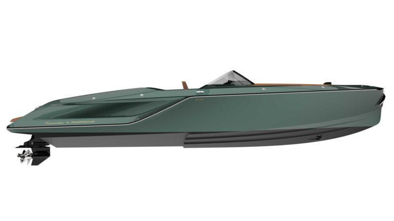 Side view of a sleek, dark green powerboat with Porsche branding and a minimalist aesthetic—the Porsche Macan EV-Powered Frauscher Fantom 850 that set a speed record in Monaco.