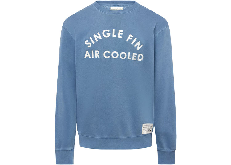 A light blue crewneck sweatshirt with the words "SINGLE FIN AIR COOLED" printed in white on the front, inspired by Almond Surfboards, and a small label near the hem.
