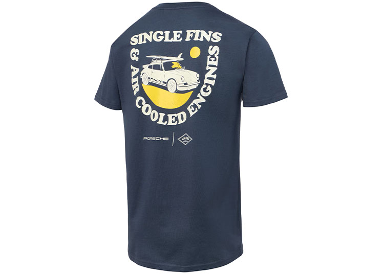 Navy blue T-shirt featuring a classic Porsche carrying a surfboard, sun backdrop, and the text "Single Fins & Air Cooled Engines" on the back. Perfect for fans of Almond Surfboards and vintage rides.