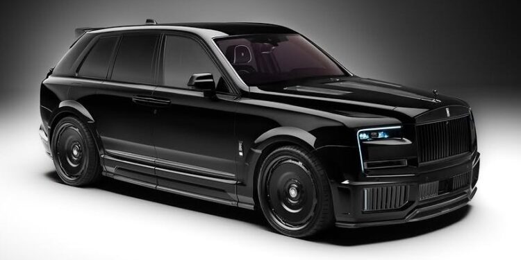 A black Rolls-Royce Cullinan luxury SUV with tinted windows, carbon fiber widebody, 24-inch black rims, and blue accent headlights is parked on a plain white background.