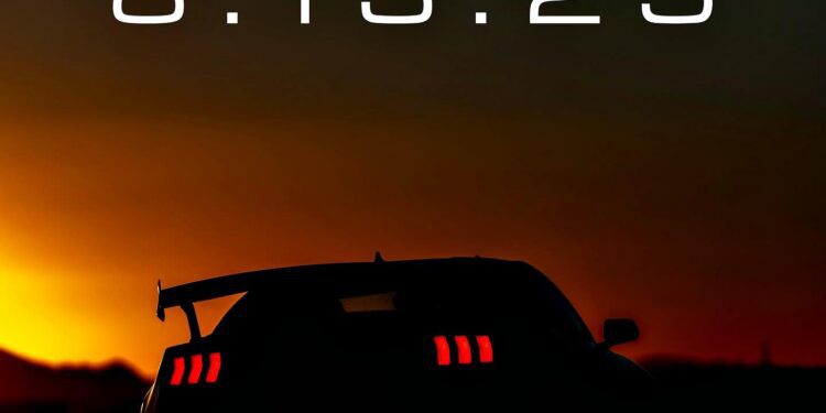 A sports car is silhouetted against a sunset with its taillights on; large text above reads "8.13.25". “The Next One”: Shelby’s Mysterious Mustang Set for Monterey Reveal.