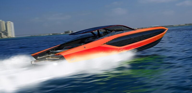 A sleek, orange speedboat moves quickly across blue water near a city skyline under a clear sky, offering an exhilarating maritime experience reminiscent of luxury yachts.