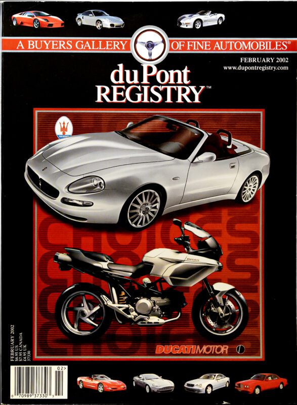 Cover of the February 2002 duPont REGISTRY featuring a silver Maserati convertible and a Ducati motorcycle, with Cover Cars and smaller images of luxury vehicles at the top and bottom.