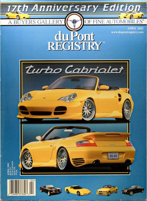 April 2002 duPont REGISTRY magazine cover featuring two yellow Cover Cars, Porsche Turbo Cabriolet, against a blue background with the headline "17th Anniversary Edition.