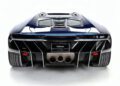 Rear view of a blue Lamborghini Centenario with visible exhaust pipes, rear diffuser, and Holman Motorcars license plate against a white background. Only 10 in the U.S.: Lamborghini Centenario Roadster hits the market.